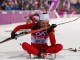 Швейцарская биатлонистка Селина Гаспарен целует свои лыжи после финиша в индивидуальной гонке на Олимпиаде в Сочи