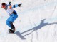 Французский спортсмен Патрис Бараттеро в соревнованиях по сноуборд-кроссу в категории "стоя"	