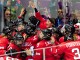 Женская сборная команда Швейцарии по хоккею празднует победу над командой Швеции в финале за бронзовую медаль