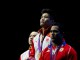 Китайский спортсмен Лу Сяоцзюнь завоевал золотую медаль Олимпийских игр в соревновании тяжелоатлетов в весовой категории до 77 кг, установив мировой рекорд