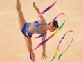 Яркие девушки: Лучшие гимнастки мира показали чудеса гибкости (фото)
