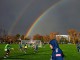 Двойная радуга над полем во время тренировки коменды Gosch's Paddock перед играми Melbourne Victory A-League, 12 мая 2015 года, в Мельбурне, Австралия. 