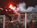 Побоище между фанами и полицией сорвало матч Италия - Сербия