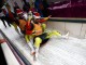 Команда из Германии празднуют победу в командной эстафете по санному спорту в Сочи