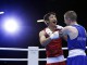 Китайский боксер Цзоу Шимин празднует победу в полуфинальном бою против ирландца Пэдди Барнса на Олимпиаде в Лондоне