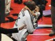 Звезда Лос-Анджелес Лейкерс Коби Брайан обнимает свою дочь Джанну Марию-Оноре во время перерыва  в Матче всех звезд NBA