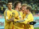 Игроки сборной Украины празднуют победу в поединке плей-офф  со сборной Франции