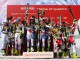 На подиуме, слева, шведская команда горнолыжников, на втором месте, швейцарская команда-победитель, и австрийцы, занявшие третье место в командном зачете на Чемпионате Мира, в Мерибеле, Франция, в пятницу, 20 марта 2015 года.