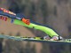 Японец Норияки Касаи исполняет прыжок на этапе на Кубка мира по прыжкам на лыжах с трамплина в Гармиш-Партенкирхене, Германия 