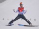 Австриец Томас Диетарт после исполнение прыжка на этапе на Кубка мира по прыжкам на лыжах с трамплина в Гармиш-Партенкирхене, Германия 