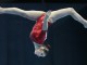 Россиянка Алия Мустафина во время исполнения упражнения на бревне на чемпионате Европы по спортивной гимнастике в Москве
