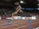 Француз Махидин Мехисси-Бенаббад преодолевает последний барьер на дистанции 3000 м с барьерами на чемпионате Европы по легкой атлетике